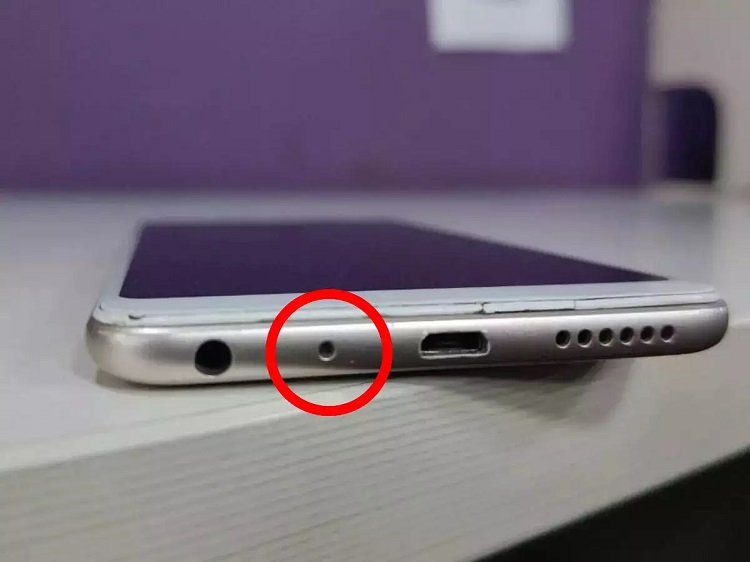 Why there is a small hole under the smartphone?