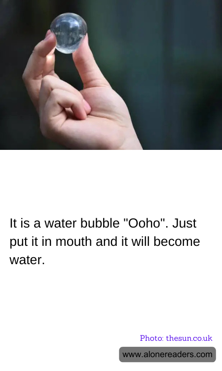It is a water bubble "Ooho". Just put it in mouth and it will become water.