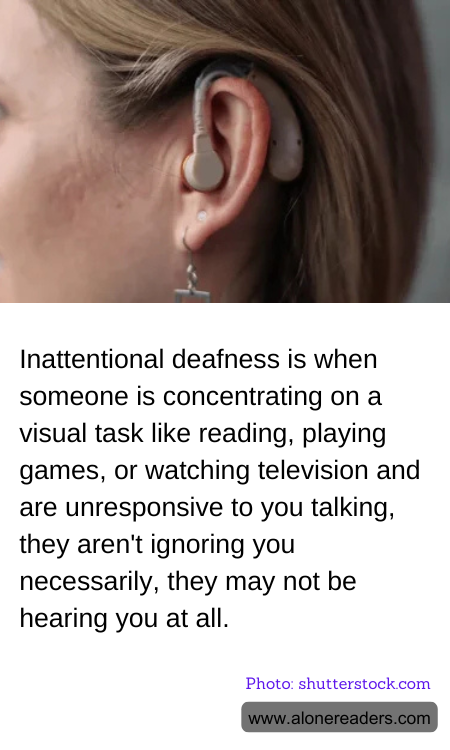 Inattentional deafness is when someone is concentrating on a visual task like reading, playing games, or watching television and are unresponsive to you talking, they aren't ignoring you necessarily, they may not be hearing you at all.
